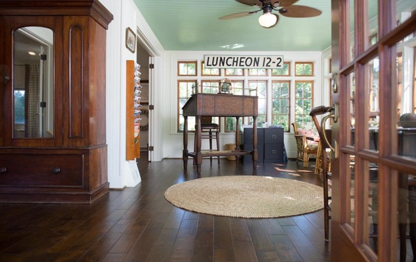 Bright lake office with dark wood floors and vintage details