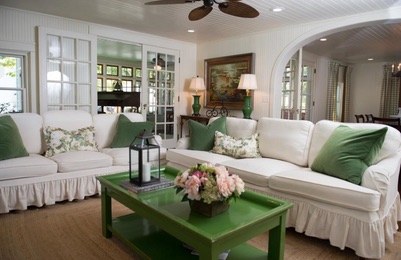 Comfortable white and green cottage living room