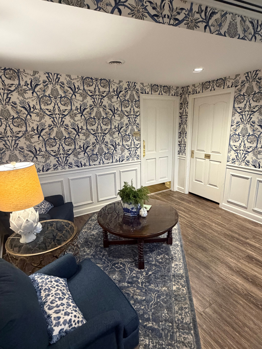 Fort Wayne Country Club ladies locker room lounge with blue botanical wallpaper